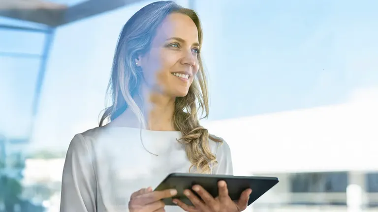 Woman holding a tablet