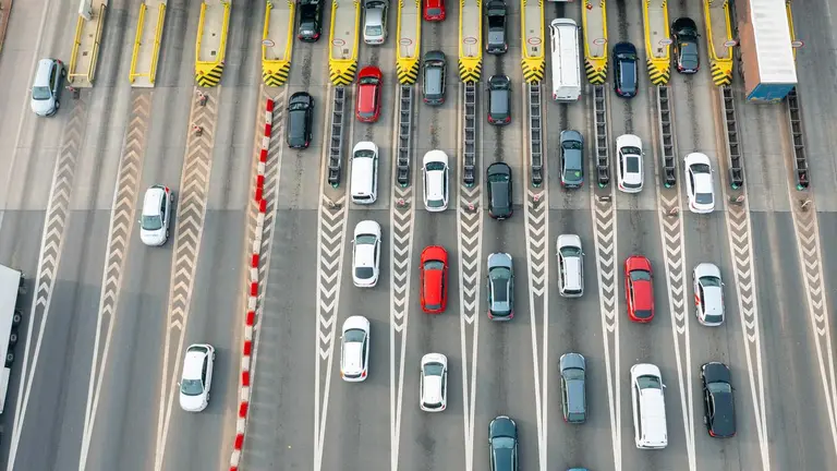 Cars lined on a toll ramp